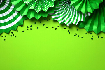 Frame top border of green paper fans and confetti. St Patrick's Day banner design, poster, greeting card template.