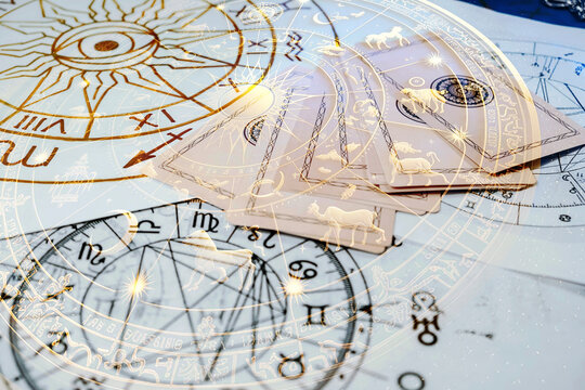Astrology. Astrologer calculates natal chart and makes a forecast of fate.Tarot cards, Fortune telling on tarot cards magic crystal, occultism, Esoteric background. Fortune telling,tarot predictions.