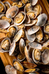 Fresh vongole on a cutting board. 