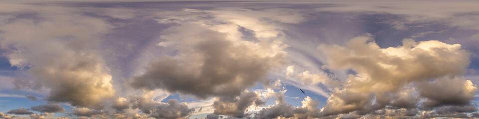 Dramatic sunset sky panorama with Cumulus clouds. Seamless hdr 360 pano in spherical equirectangular format. Complete zenith for 3D visualization, game and sky replacement for aerial drone panoramas