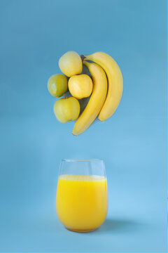 set of yellow fruits for juice, banan, laym, apples
