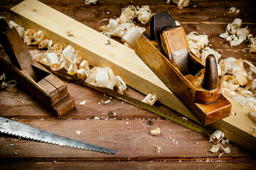 Working tool. Planer with wooden shavings. 