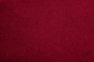 Close up of fabric texture toned in Viva Magenta trendy color