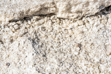 Textured background of the salt. Selective focus. Close up of salt. High quality photo