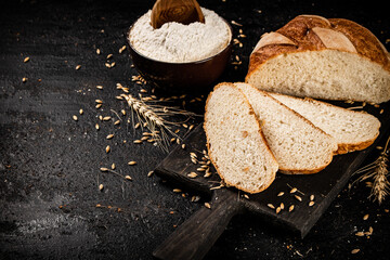 Sliced wheat bread on a cutting board. 