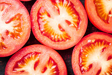 A round piece of tomato. Macro background. 