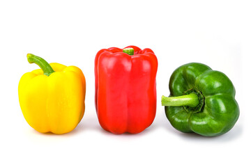 Obraz na płótnie Canvas Red , green and yellow bell peppers isolated on white background