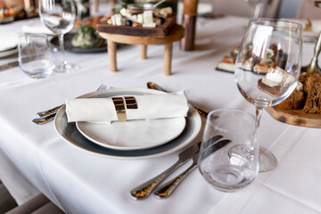 table setting in a restaurant at a birthday party, a wedding, a plate