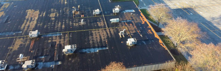 Panorama rooftop units HVAC system provide heating, cooling, and ventilation at large commercial building in Pittsford, New York, US