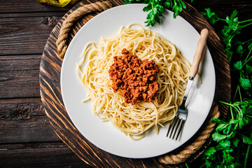 Delicious spaghetti bolognese with parsley. 