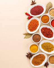 Various dried spices in small bowls