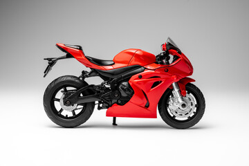 Fototapeta na wymiar red sportbike motorcycle model on white background