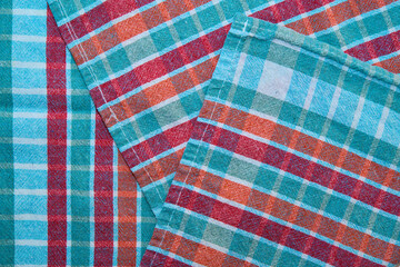 green, orange and red fabric 