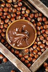 Hazelnut butter on a wooden tray. 