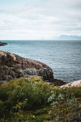 Stunning rough coast in Norway during autumn with pretty mountains
