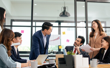 Group of business asian people wearing formal suits, talking, meeting and discussing their projects at office. Working and Teamwork Concept.