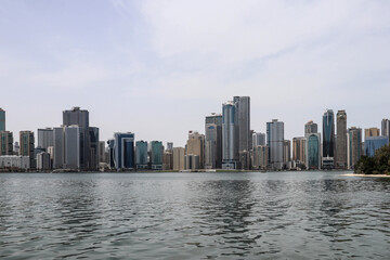 Fototapeta na wymiar Sharjah, United Arab Emirates - 01.05.2022 : skyline in Sharjah and the waterfront