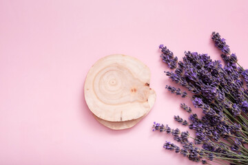 Podium, stage or pedestal with lavender flowers top view. Mock up for cosmetic products .