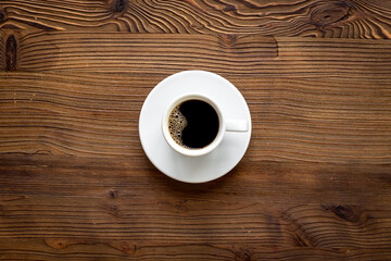 White cup of hot espresso coffee. Morning routine concept