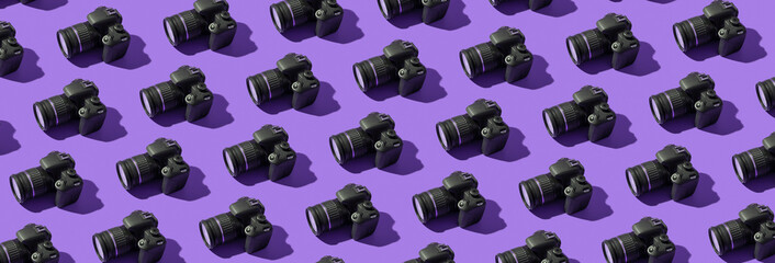 Obraz premium Banner with pattern from photo cameras on colored background. World Photography Day concept