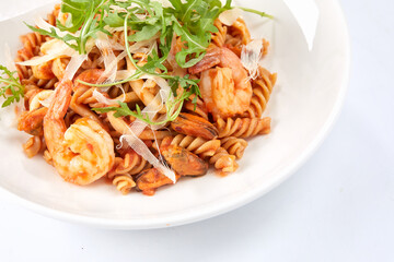 pasta with shrimps and salad