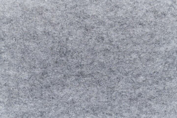 Soft felt textile material gray color, colorful texture flap fabric background closeup