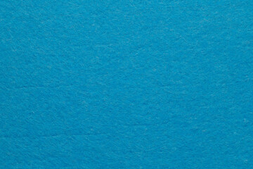 Obraz na płótnie Canvas Soft felt textile material Blue colors, colorful texture flap fabric background closeup