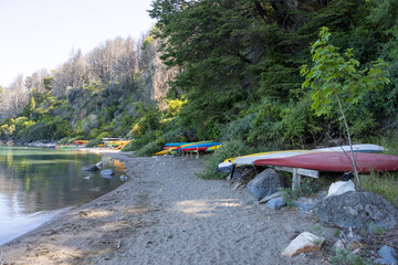 Colorful kayaks at the beach of  Lago General Carrera near the famous Marble Caves in southern Chile 