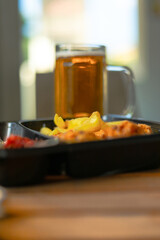 beer and fried snacks on the table
