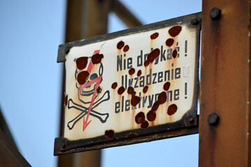 High voltage warning sign - skull, thunderbolt sign and crossed bones