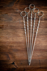 Skewers for kebab on the table.