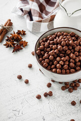 sweet crunchy chocolate children's breakfast chocolate balls on a white background