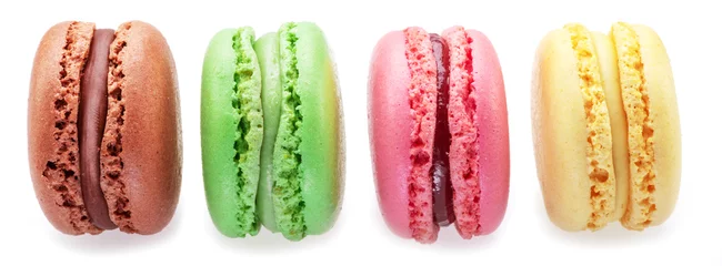 Keuken spatwand met foto Set of four colorful french macarons isolated on white background. © volff