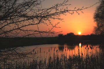 sunset over an english pond