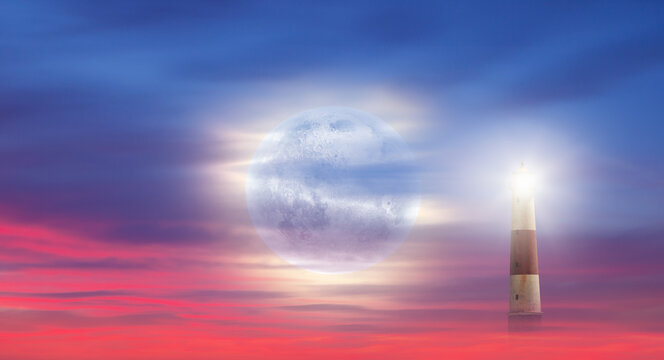 Dusk sky with super full moon in the clouds, on the foreground lighthouse "Elements of this image furnished by NASA"