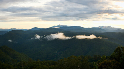 morning scene of hills, clouds and peaceful sunrise sky background in Da Lat highland, Vietnam