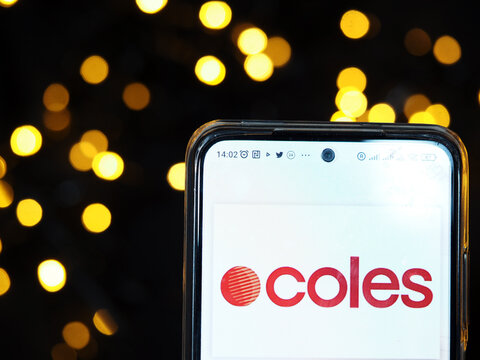 In this photo illustration, the  Coles Supermarkets Australia Pty Ltd. shopping logo is displayed on a smartphone screen