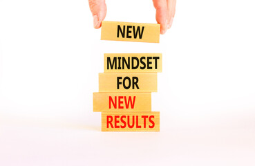 New mindset and results symbol. Concept words New mindset for new results on wooden blocks. Beautiful white background. Businessman hand. Business new mindset for results concept. Copy space