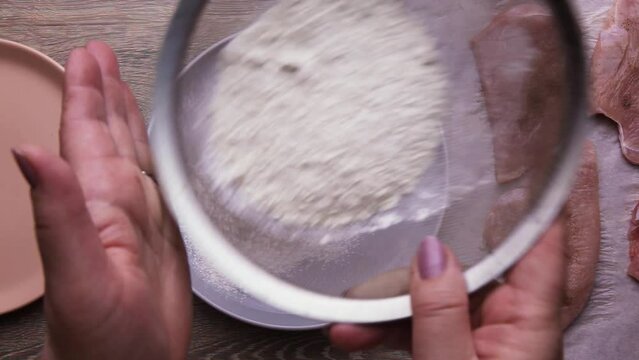 Flour Cooking Pork chop roll in flour, fry