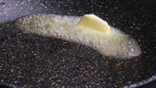 butter is melting in a frying pan, melt the butter