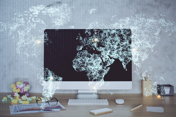 Computer on desktop with social network hologram. Double exposure. Concept of international people connections.