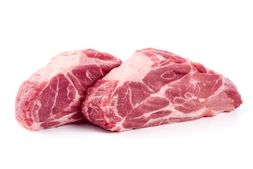 Raw pork shuulder steaks, isolated on white background. High resolution image.