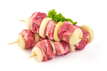 Raw pork skewers, ready to cook, BBQ, isolated on white background.