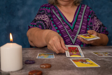 woman casting tarot cards