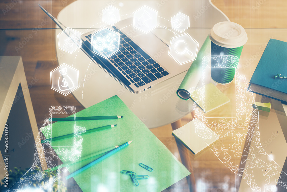 Poster computer on desktop in office with technology theme hologram. double exposure. tech concept.