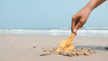 Fototapeta na wymiar hand with sand