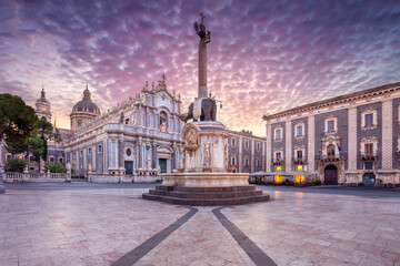 Catania, Sicily, Italy. Cityscape image of Duomo Square in Catania, Sicily with Cathedral of Saint Agatha at sunrise. - 564328712
