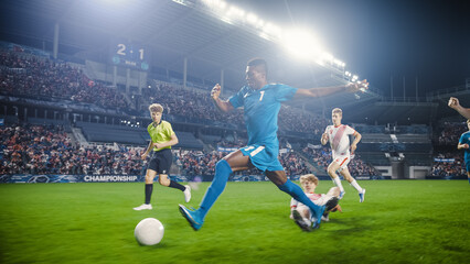 Professional Soccer Football Match Championship: Blue Team Attacks, Black Forward Masterfully Dribbles on an International Tournament. Stadium of Fans Cheers. Beautiful Cinematic Edit.