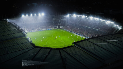 Aerial Establishing Shot of a Whole Stadium with Soccer Championship Match. Teams Play, Crowd of Fans Cheer. Football Tournament, Cup Broadcast. Sport Channel Television, Screen Content. - obrazy, fototapety, plakaty