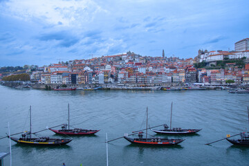 Fototapeta na wymiar Nice traditional boats on the Douro River between Porto and Villa Nova de Gaia